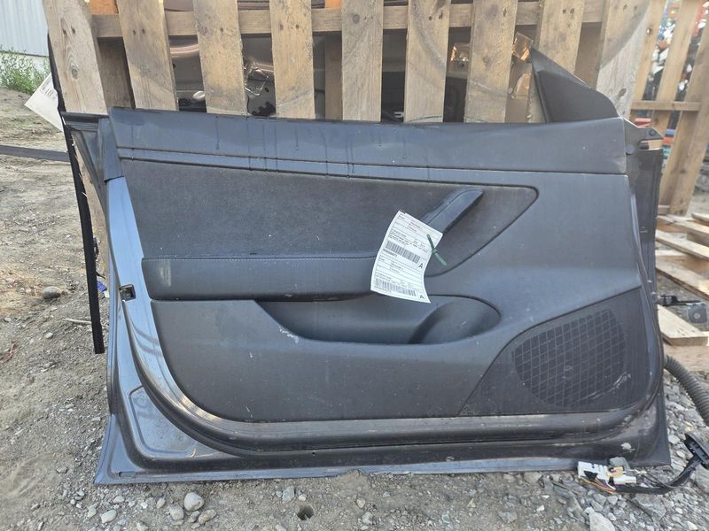 Used 2020 Tesla Model 3 front left door assembly grey — part view 3; Elite stock EA1001