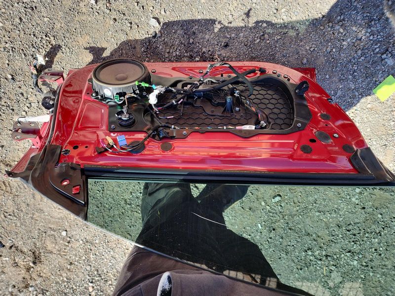 Used 2020 Tesla Model 3 front left door assembly red — part view 2; Elite stock EA1119