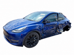 2022 Tesla Model Y Front Bumper Assembly – Blue – Stock EA1434; white background donor vehicle reference only, listed bumper only